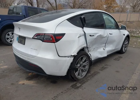 2022 Tesla Model Y Long Range Dual Motor All-Wheel Drive z USA, uszkodzony, nr VIN 7SAYGDEE9NF364519